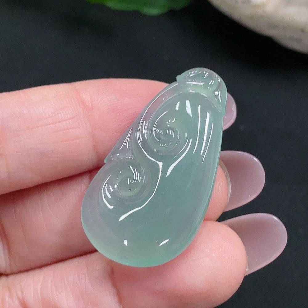 Jadeite Ruyi pendant from HUILIU HQ, smooth green jade with intricate Ruyi design, weighing approx. 5.98g.