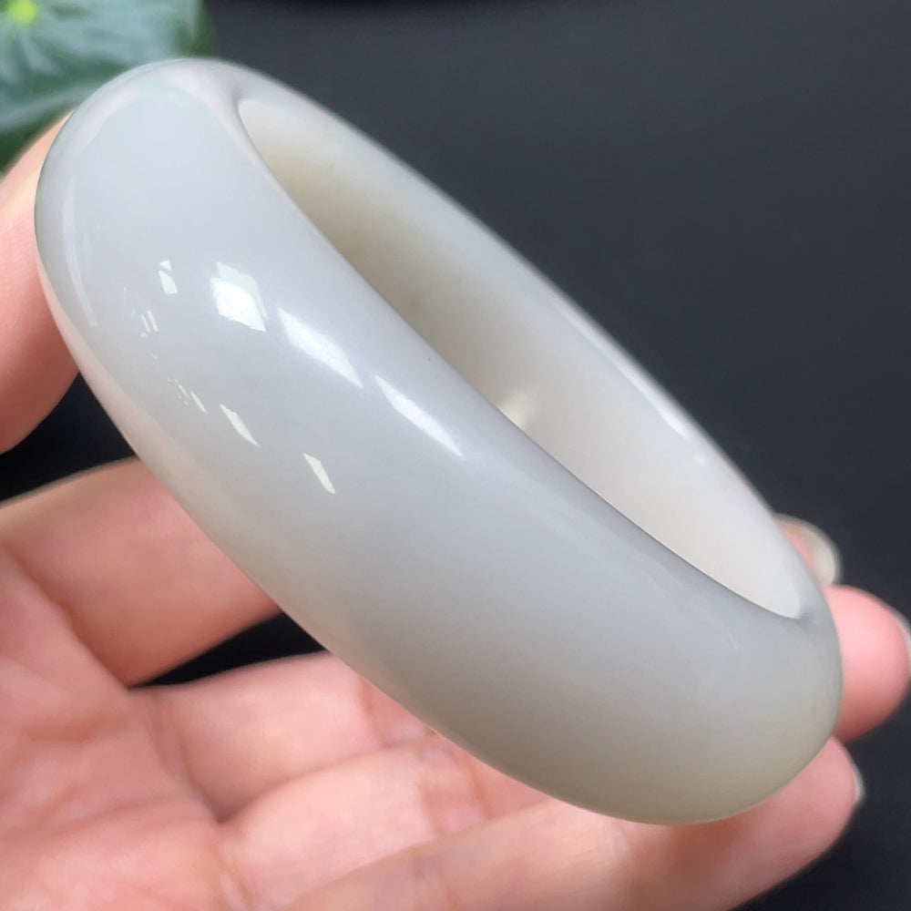 HKHQ Hetian Jade round bracelet, 60.1mm, weighing approx. 98.35g, showcasing smooth, polished green jade beads.