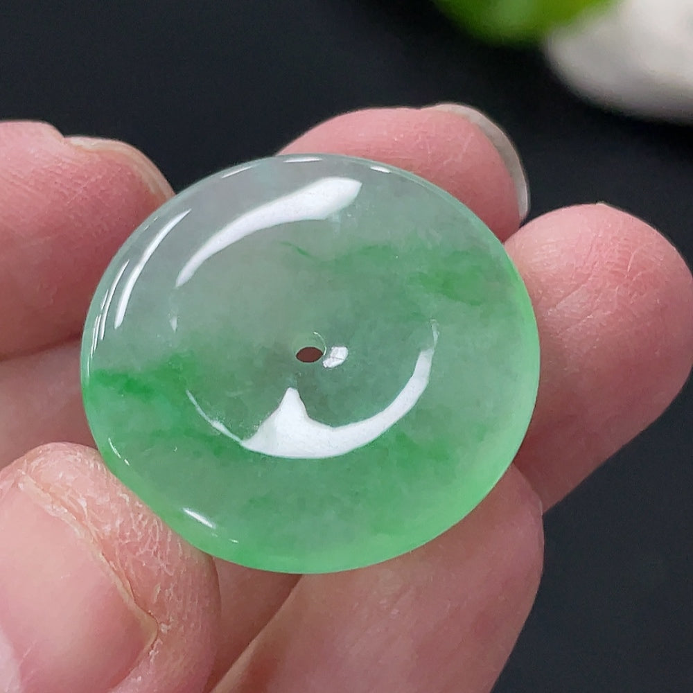 Jadeite Peace Knot pendant from HUILIU HQ, crafted from green jade, weighs approximately 5.4 grams, showcasing intricate knot design.