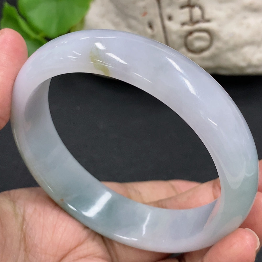 HKHQ jadeite round bracelet with a total weight of 64.3g and size 59.4, featuring smooth, polished jadeite beads.