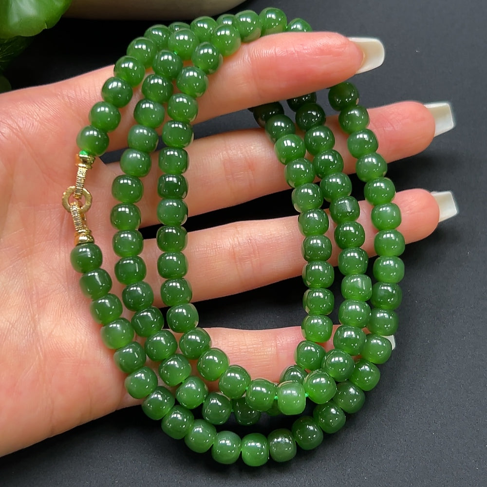 Hetian Jade bead necklace by HKHQ featuring 7.2mm non-gold jade beads, showcased with a close-up of the elegant strand.