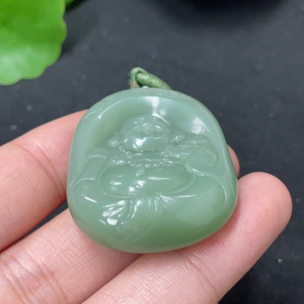 Hetian Jade Jasper Pendant with Buddha figure, weighing approximately 28.6g including rope, crafted by HKHQ.