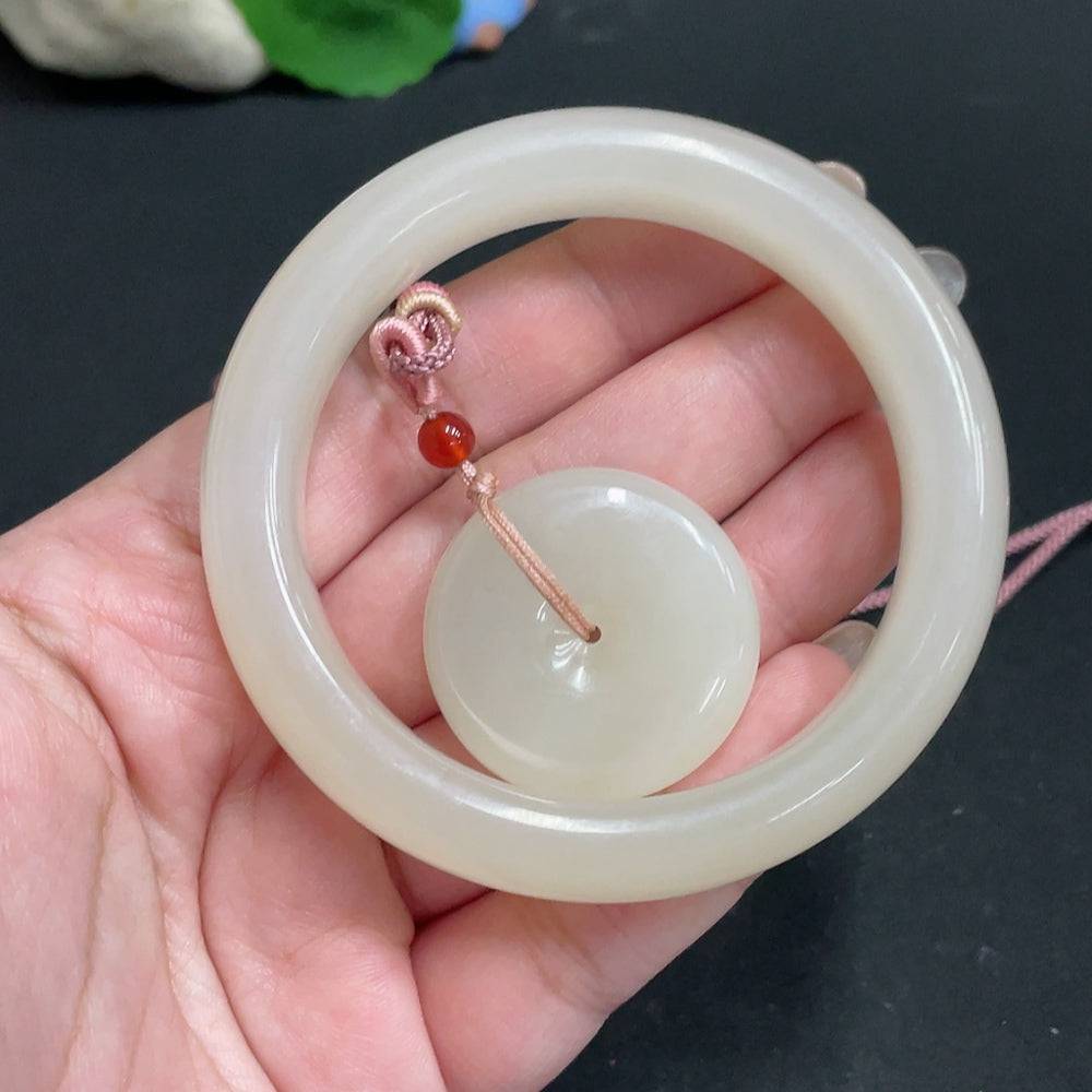 Hetian jade pendant and regular circle bracelet from HUILIU HQ, featuring smooth green jade stones and elegant jewelry design.