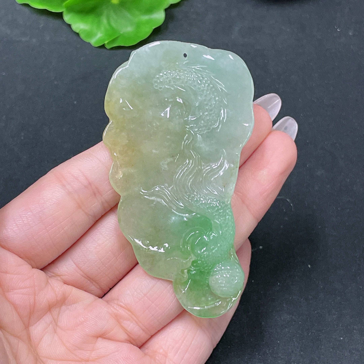 Jadeite pendant featuring a detailed dragon plaque, crafted from jade, weighing approximately 36.62g, by HUILIU HQ.