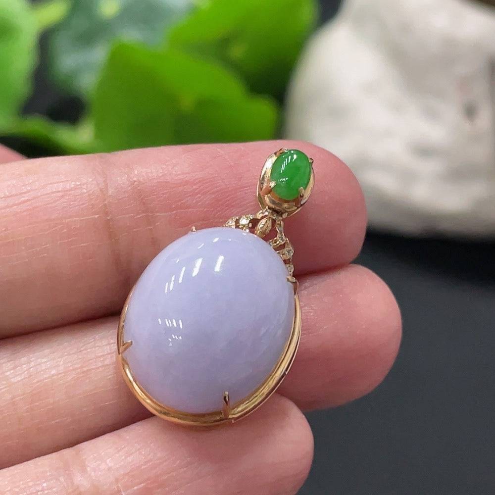 Huiliu Jadeite inlaid cabochon pendant with diamond accents, showcasing intricate craftsmanship and elegant design.