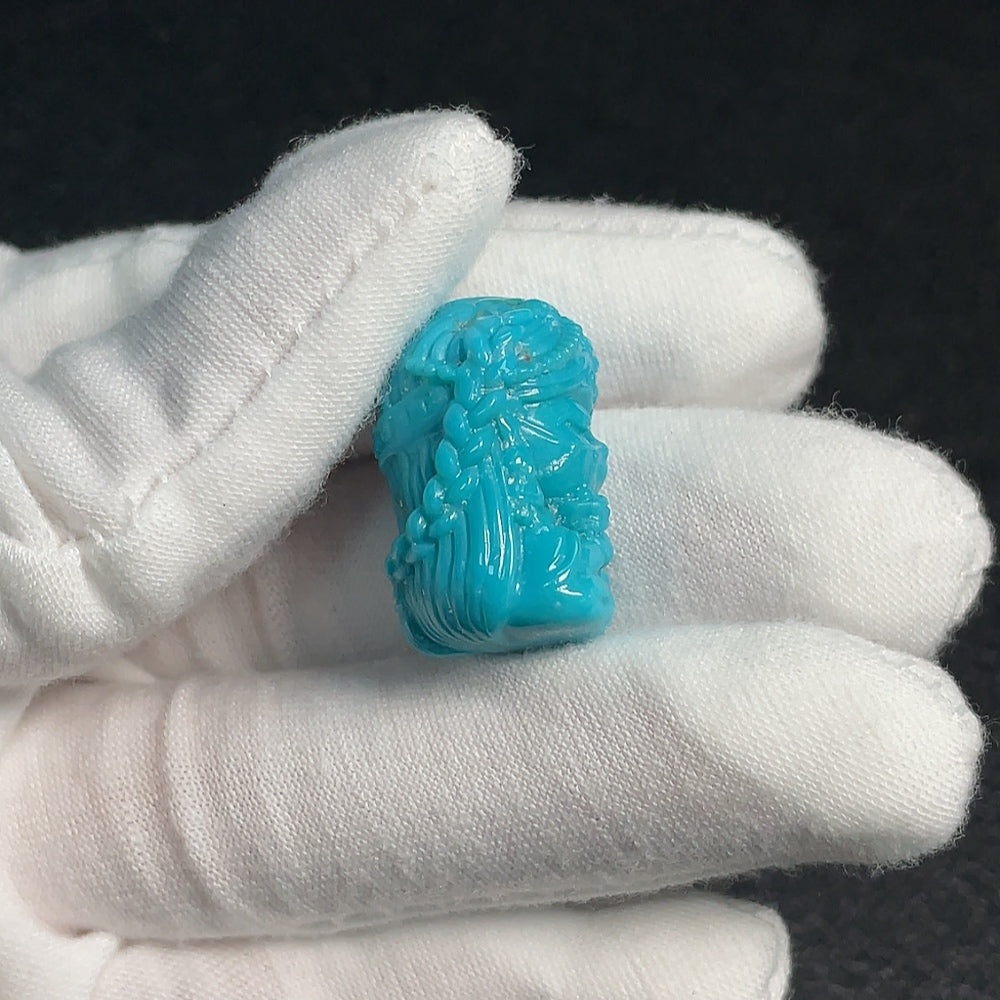 HUILIU HQ turquoise gemstone pendant with undetermined color, weighing approximately 9.03g, displayed against a neutral background.
