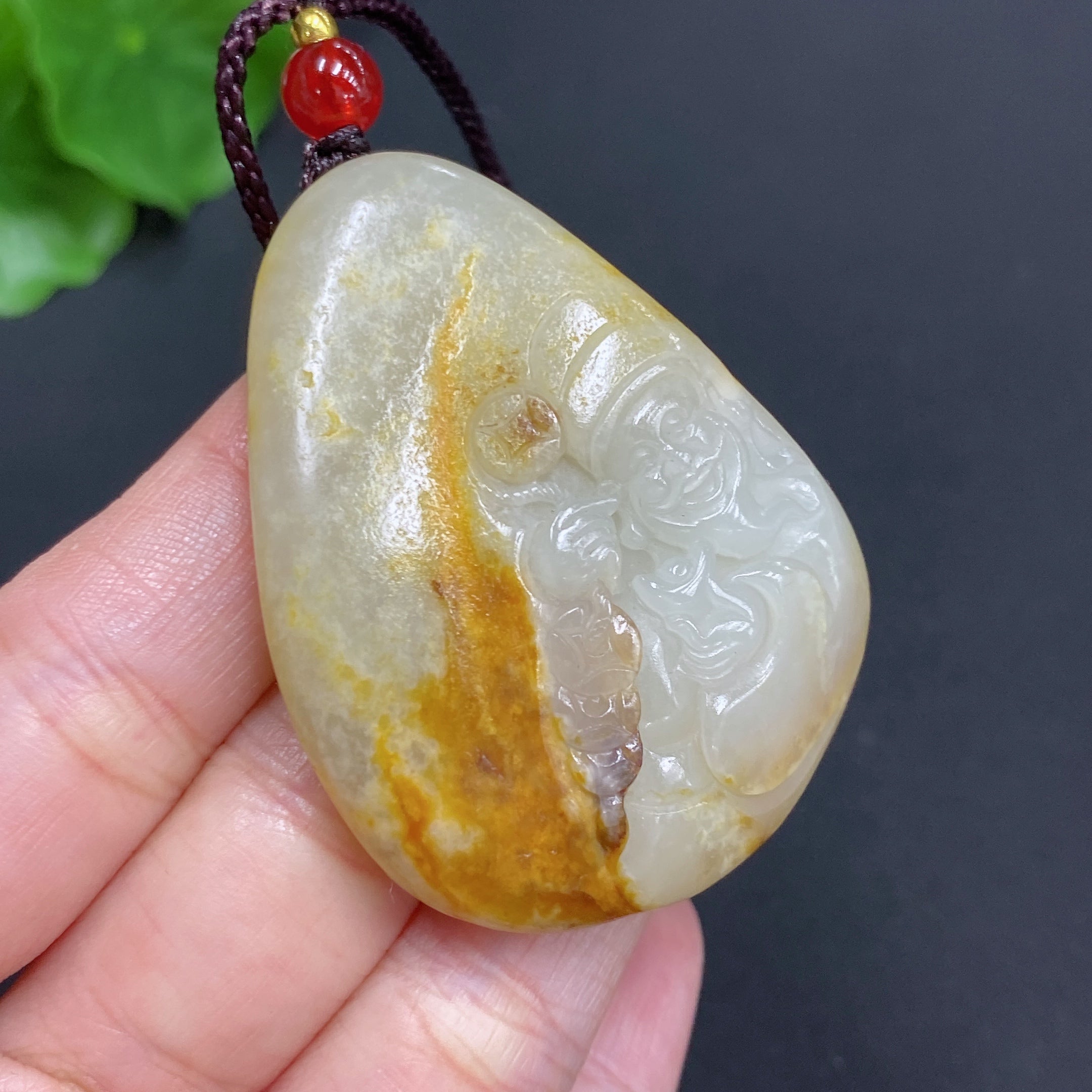 Hetian Jade Pendant God of Wealth Total Weight (including rope): 35.1g Undetermined skin color cause