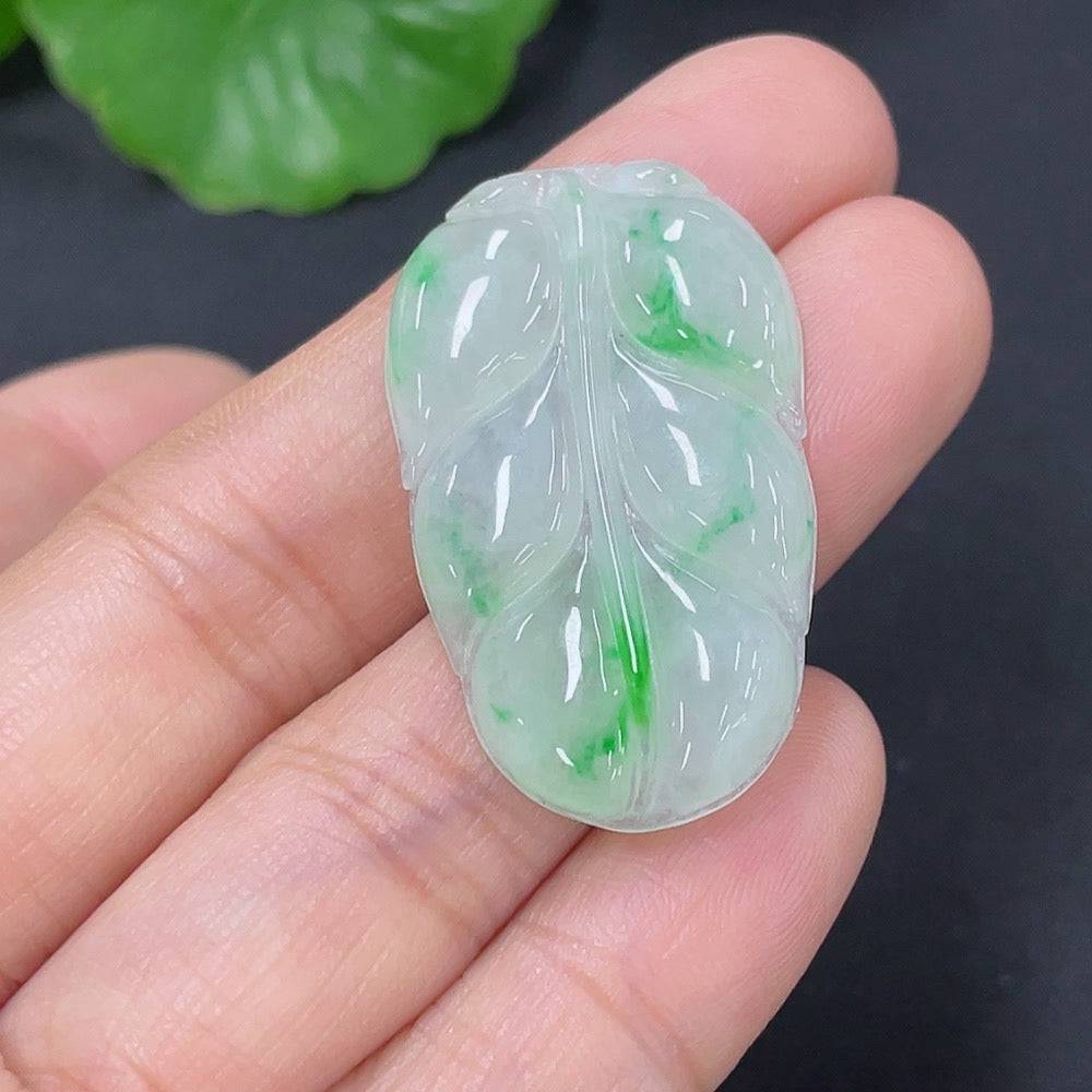 Huiliu Jadeite pendant in leaf shape, certified jade jewelry with intricate natural green jade design.