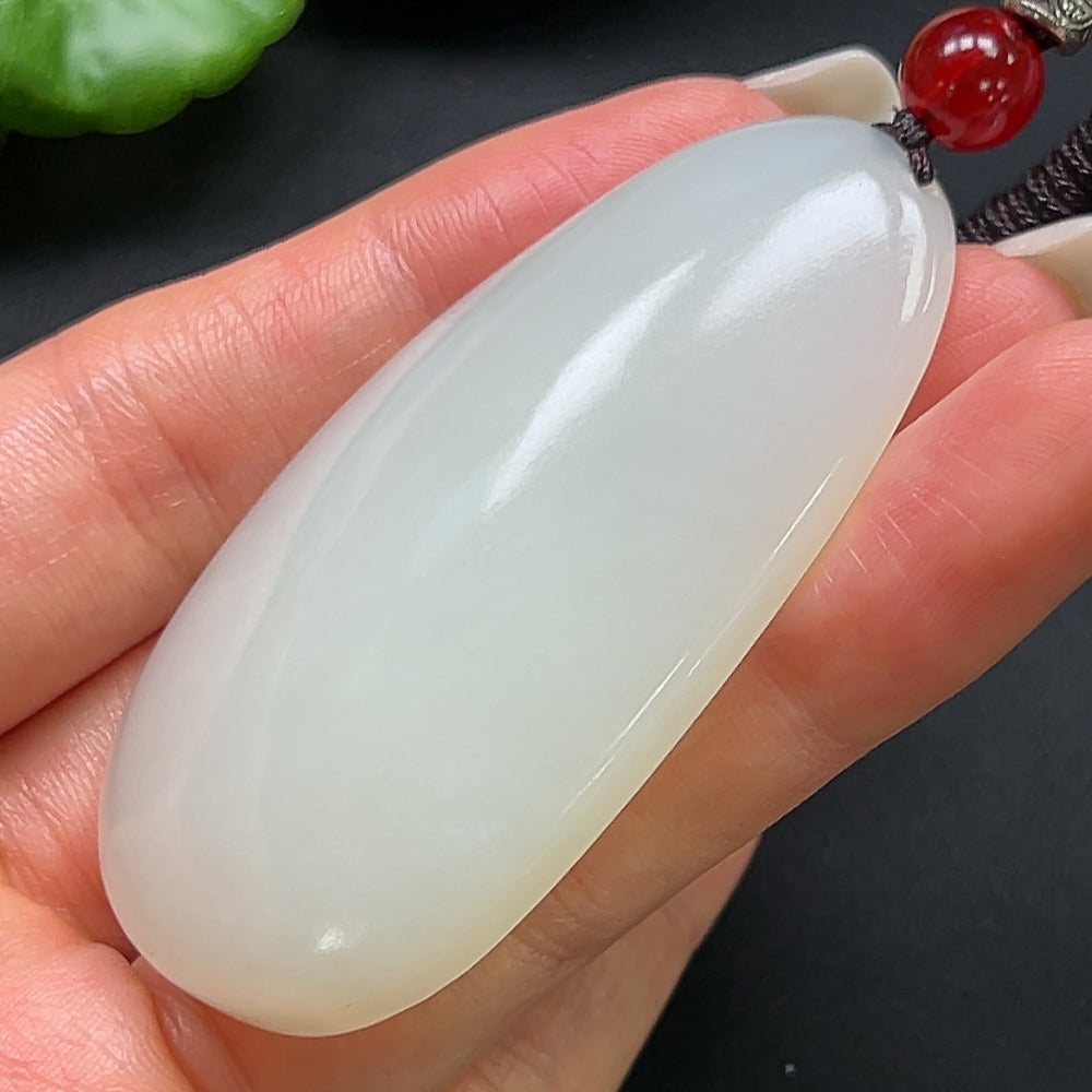HKHQ Hetian Jade plain pendant necklace with rope chain, featuring a smooth jade pendant weighing 43.84g, crafted for elegant wear.