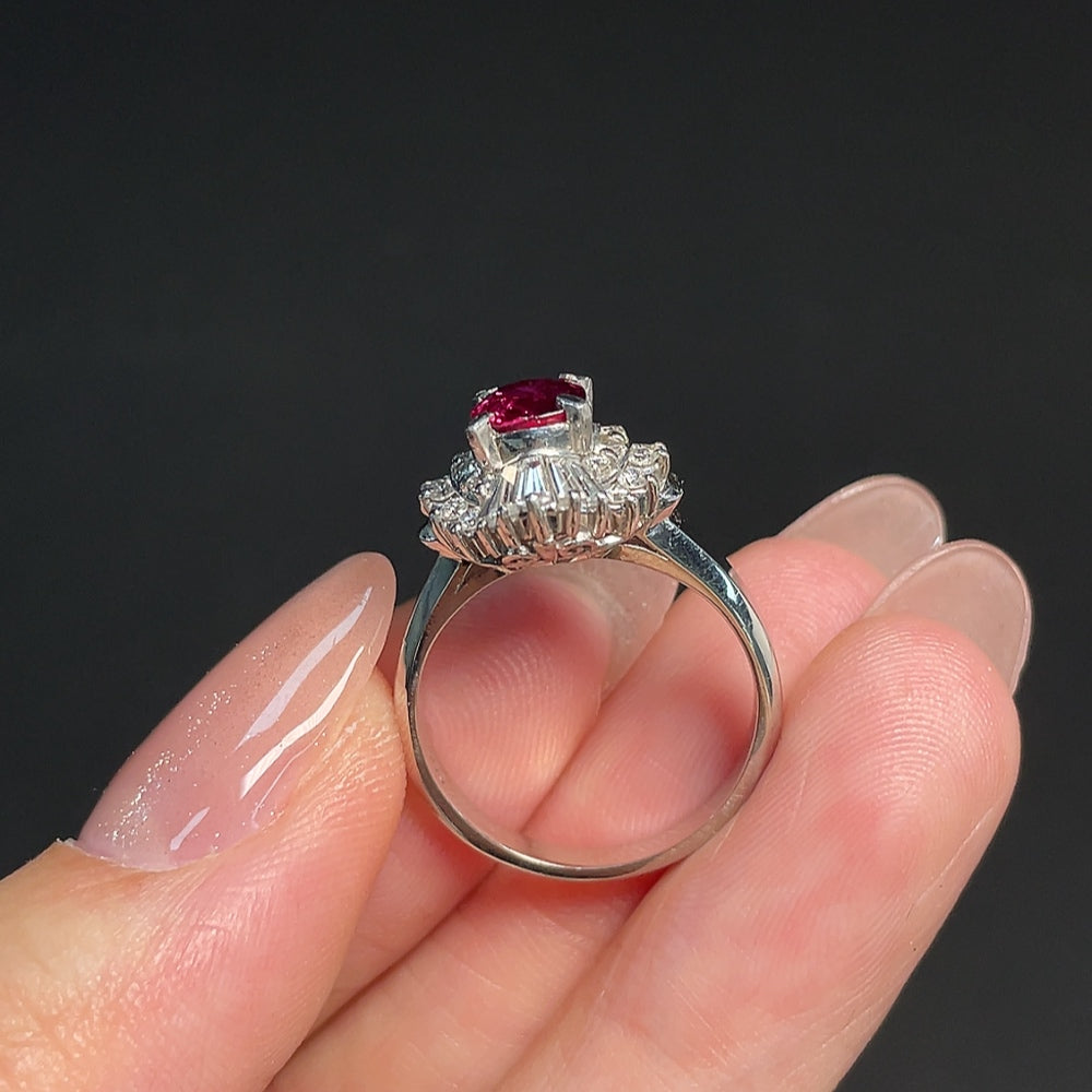 HKHQ Ruby Ring PT900 with diamond accents, size 14, showcasing vibrant rubies and sparkling diamonds on a polished band.
