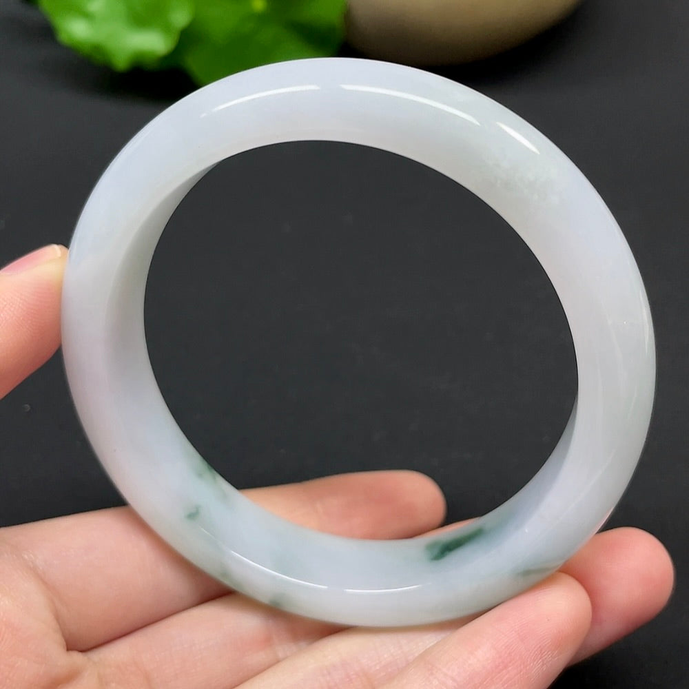 HKHQ jadeite round bangle, size 57.1, weighs 56.21g, showcases smooth green jadeite surface and classic bracelet design.
