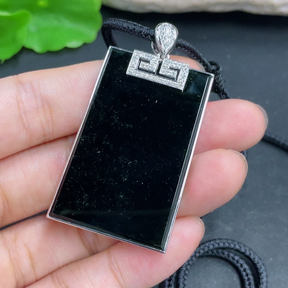 Jadeite plain pendant with 18K gold and diamond accents, hanging on a necklace chain, showcasing elegant jewelry design.