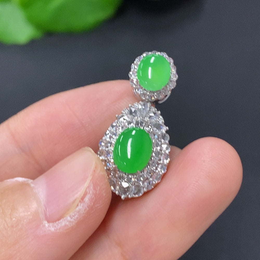 Jadeite cabochon pendant with diamond accents in 18K gold, crafted by HKHQ, showing the polished green jade stone and gold setting
