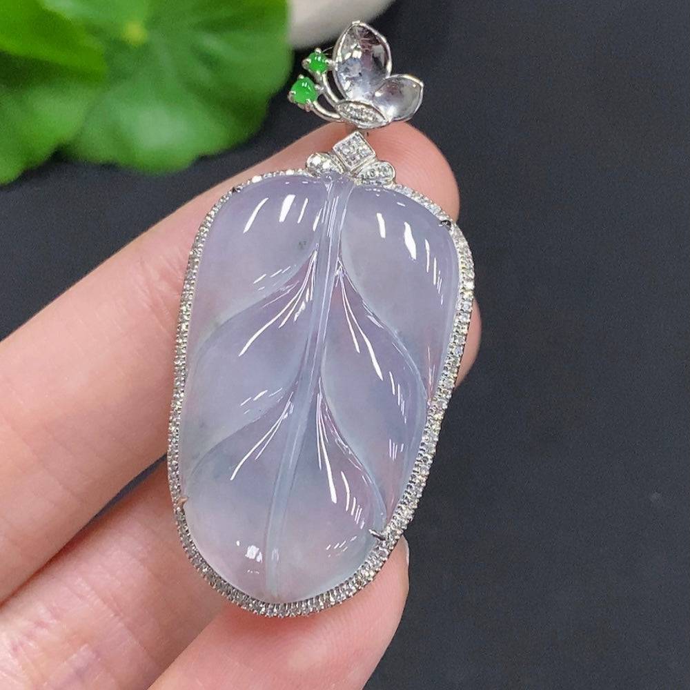 Huiliu jadeite leaf inlay pendant with diamond accents, crafted from high-quality jade, featuring detailed leaf design and sparkling stones.
