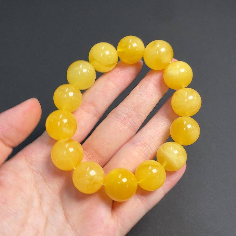 Huiliu Amber Beeswax Bracelet, about 15.5mm size, featuring natural amber beads and a polished finish.