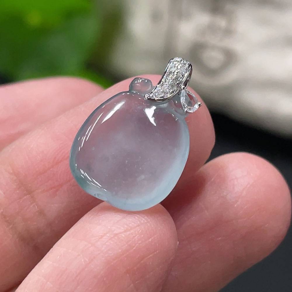 Jadeite apple pendant set with diamonds, 18k gold clasp, from HUILIU HQ, showing the detailed carved jade fruit design.