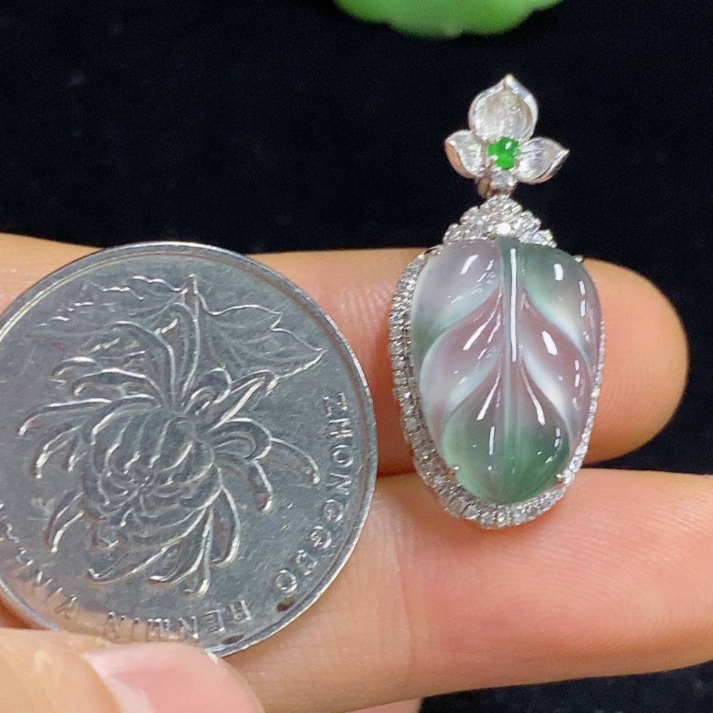 Jadeite leaf inlaid pendant with 18k gold and diamond accents, crafted by HUILIU HQ, weighing approximately 2.53 grams.