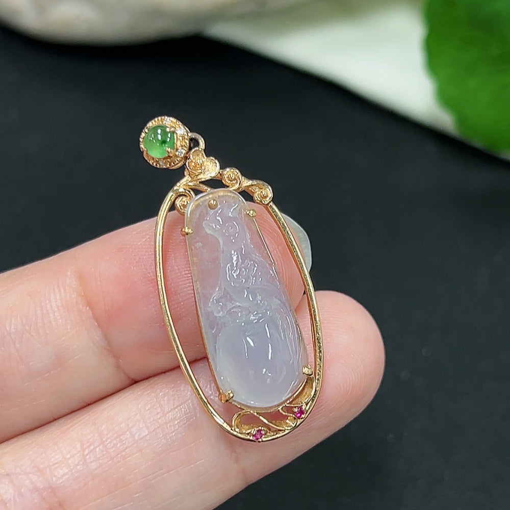 Jadeite pendant with 18K gold setting and diamond accents, showcasing a smooth, polished green jade stone on a necklace.