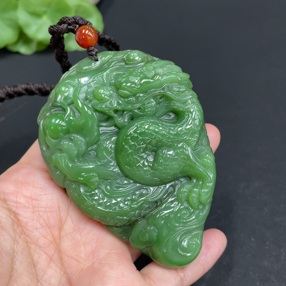 Huiliu HQ Hetian Jade hand-carved dragon figure, Huiliu certified, featuring detailed dragon design on smooth jade surface