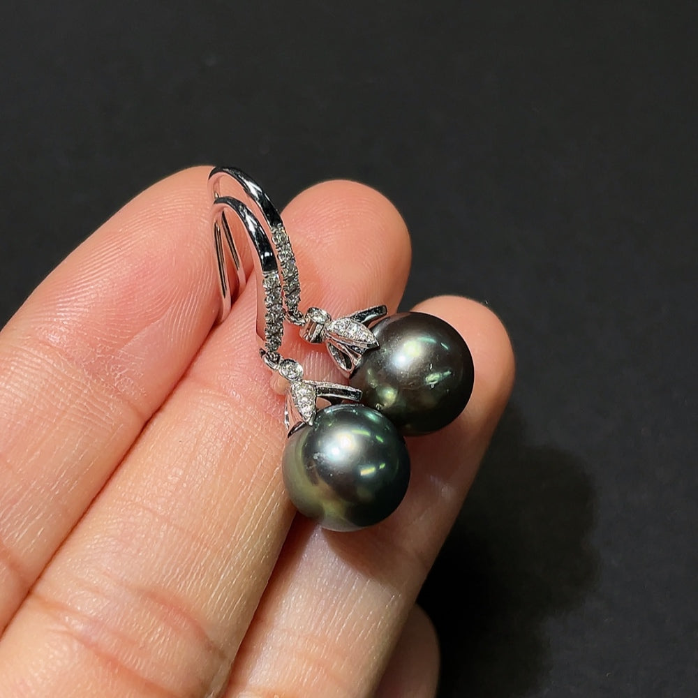 Seawater pearl earrings with 18K gold and diamond accents, approx. 10.6mm size, from HKHQ, featuring elegant jewelry design.