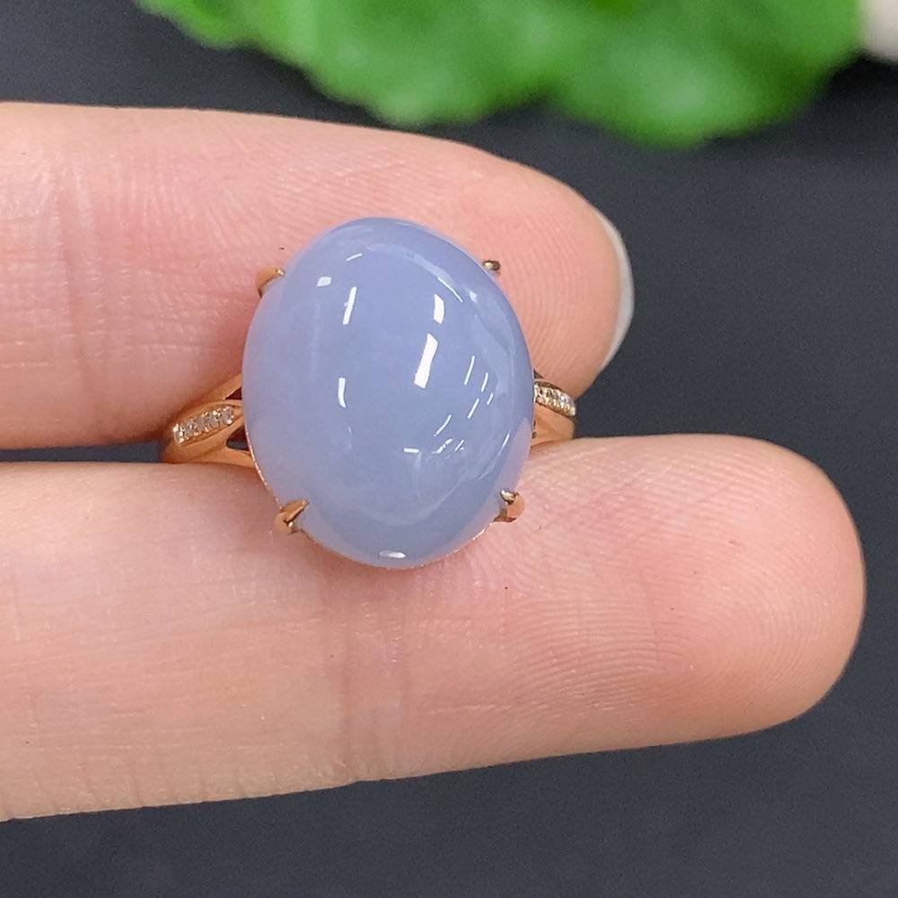 Huiliu Jadeite cabochon ring with diamond accents, featuring a polished green jade stone set in a silver band.