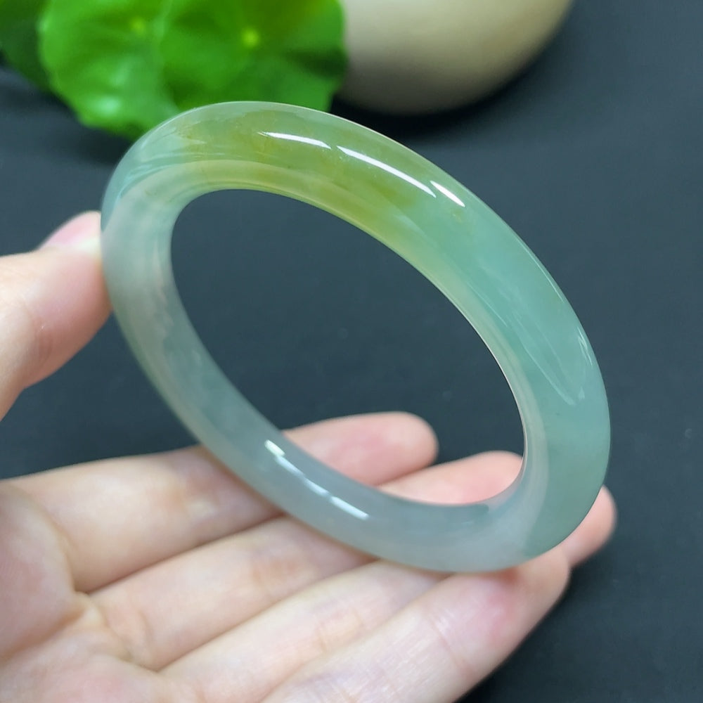 HKHQ jadeite round bangle in size 52.4 with a polished finish, weighing 41.46g, showcasing smooth, vibrant green jadeite craftsmanship.