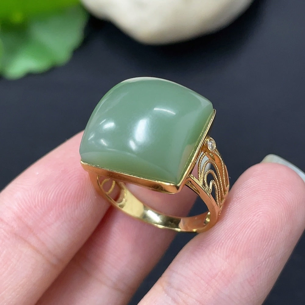 HKHQ Hetian jade ring with diamond accents, set in 18K gold, featuring a detailed and elegant design.