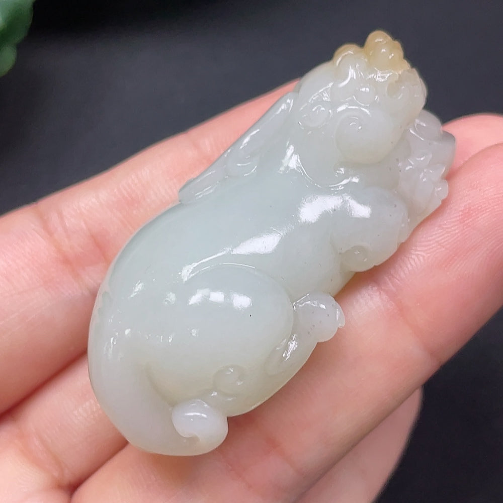 Hung Hetian jade Pixiu pendant from HKHQ, featuring a detailed carved mythical creature, weighs approximately 73.49g.