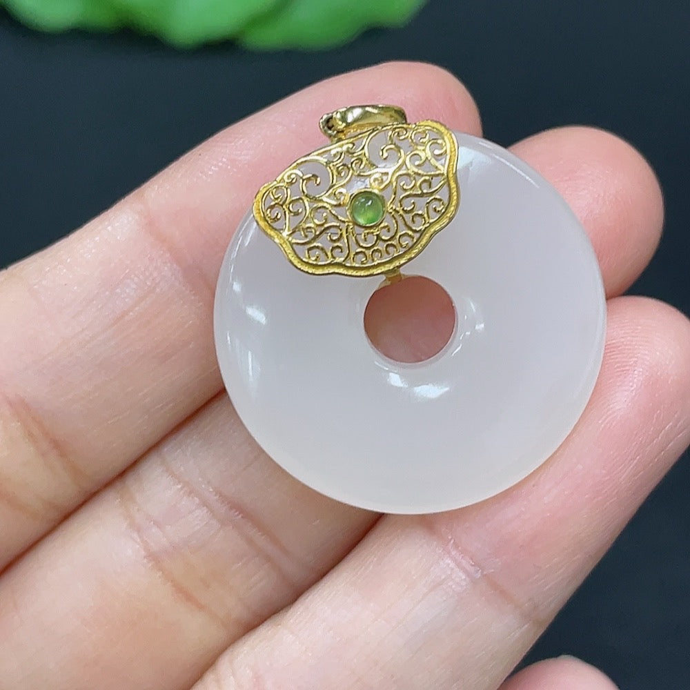 HKHQ Hetian Jade Inlaid Pendant Donut Necklace with 18K Gold setting, showcasing a smooth jade stone and intricate gold details.
