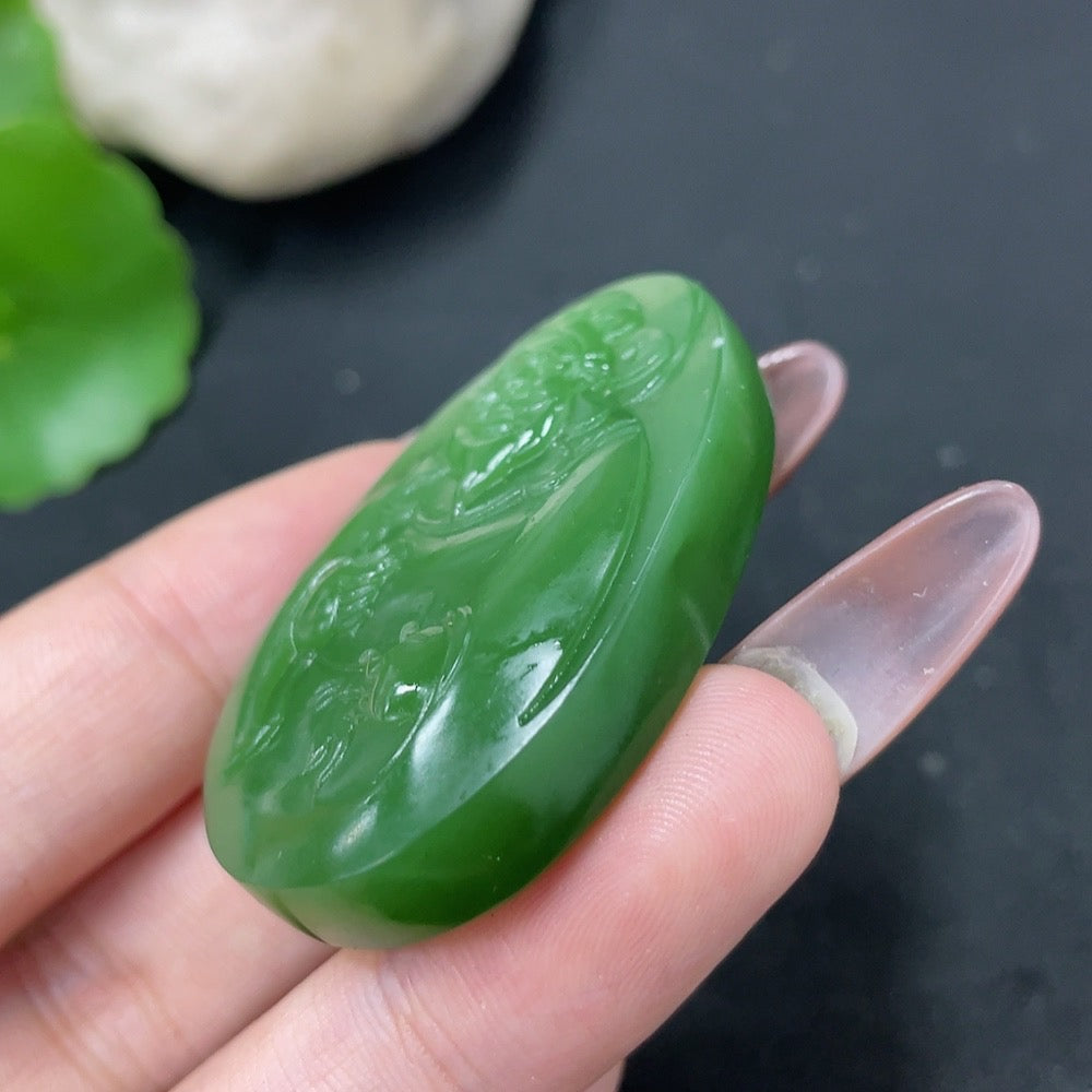 Hetian Jade Jasper Pendant with God of Wealth design, weighing about 28g, crafted by HKHQ, showcasing detailed jade craftsmanship.
