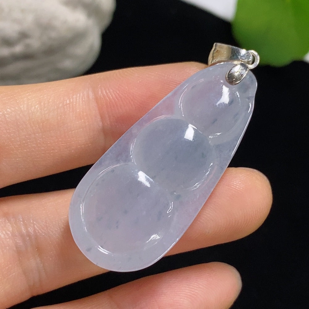 Jadeite Lucky Bean Pendant necklace by HKHQ featuring a smooth, green jadeite bean on a simple cord.