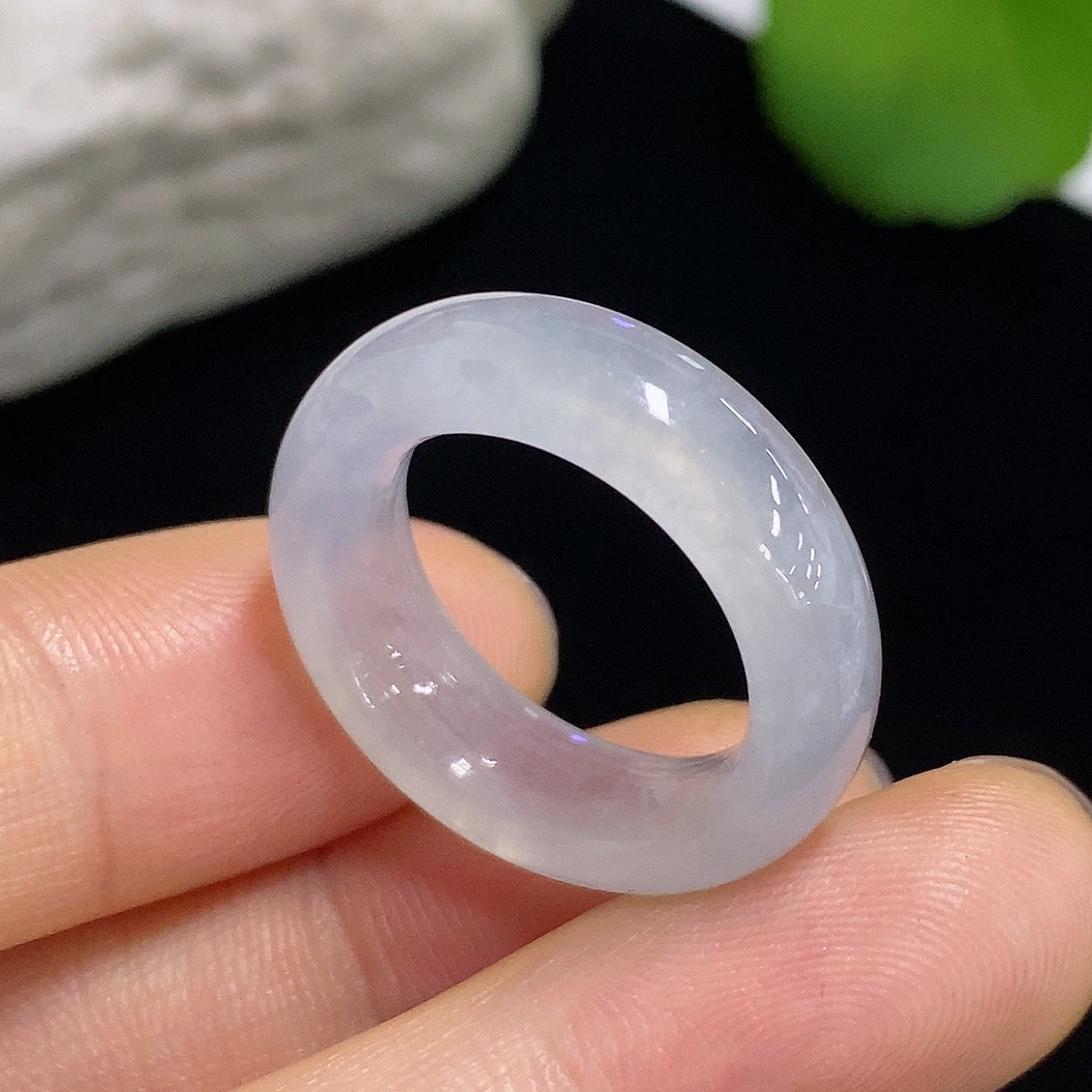 Elegant jadeite ring from HKHQ featuring a smooth, polished jade stone set in a sleek band.