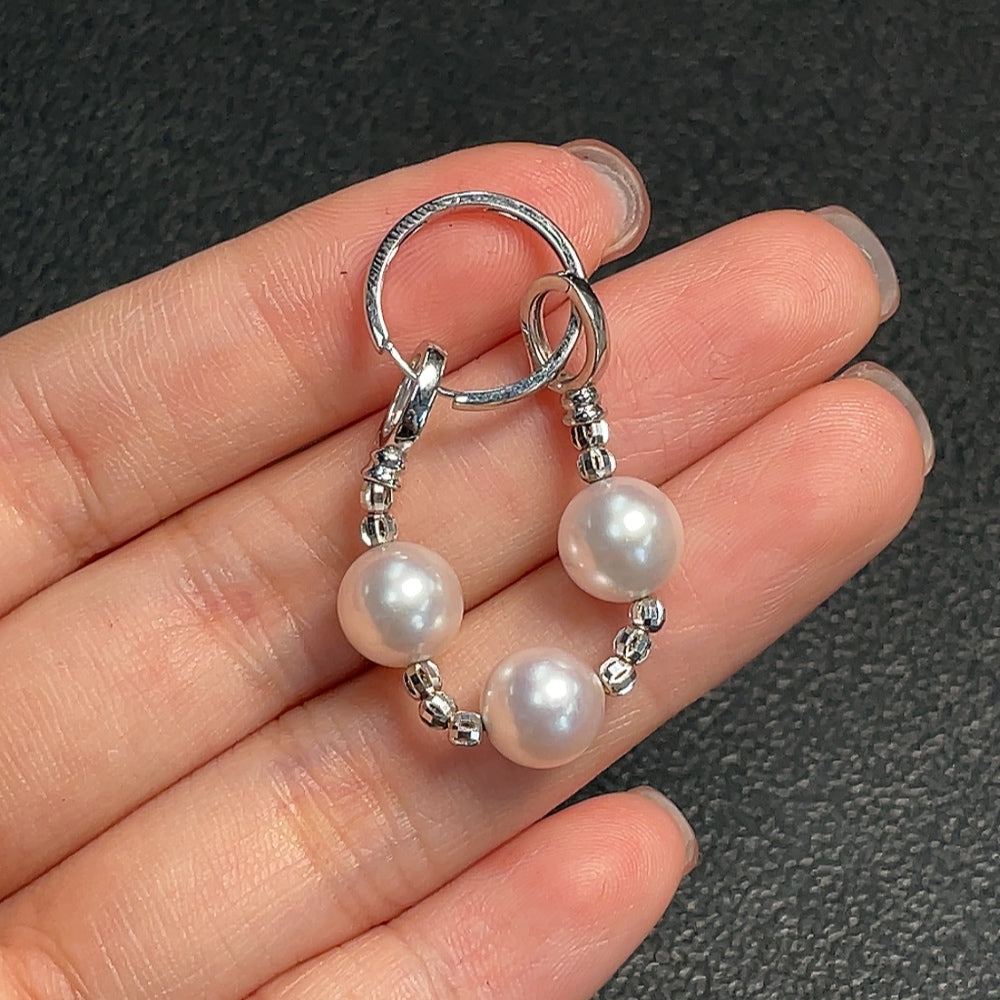 Huiliu certified seawater pearl pendant featuring a 7.9mm lustrous pearl on a string, showcasing elegant jewelry design.