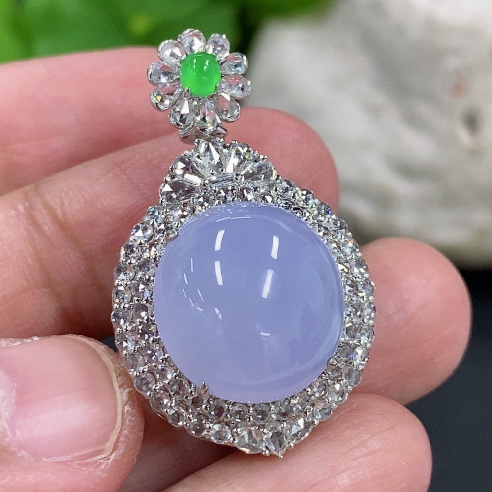 Jadeite cabochon pendant with 18K gold setting and diamond accents, featuring a elegant necklace design by HKHQ.
