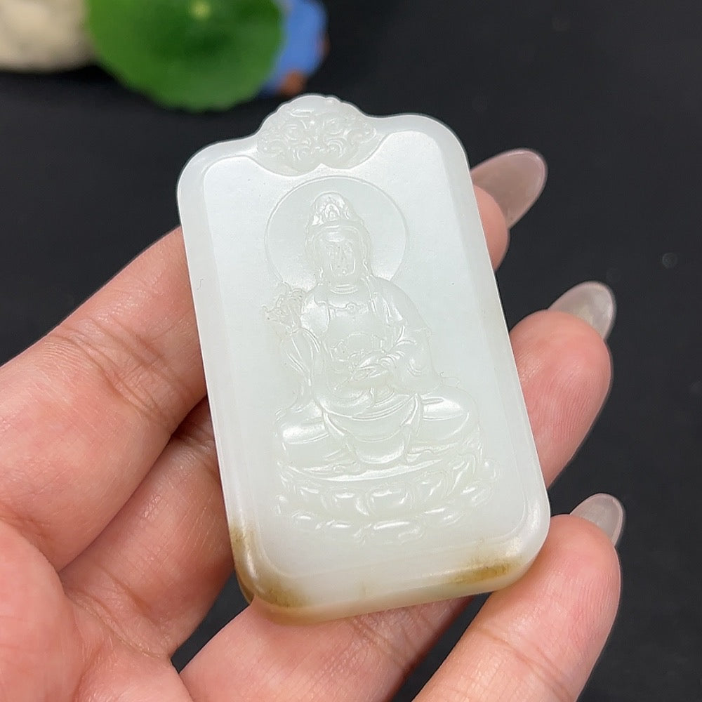 Hetian Jade Pendant featuring Guanyin figure, weighing approximately 61.3g, crafted by HKHQ, showcasing detailed jade artistry.