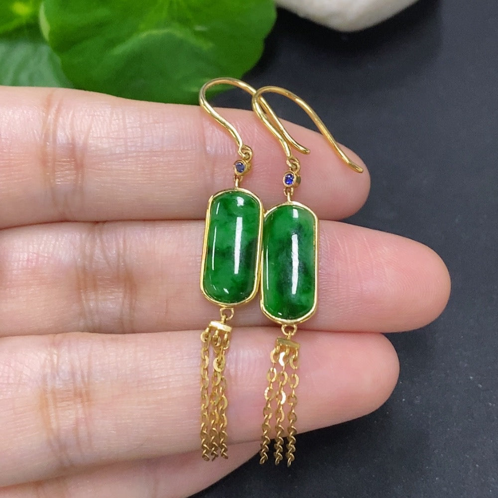 Jadeite earrings with 18K gold hooks, featuring smooth green jade gemstones, designed by HKHQ for elegant wear.