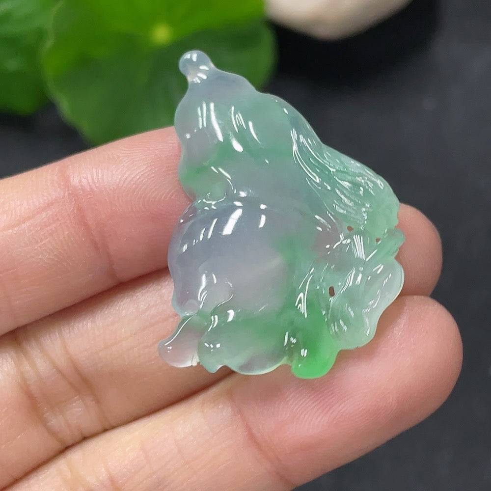 Jadeite pendant featuring a butterfly fairy design from HUILIU HQ, showcasing the detailed carved jade butterfly and fairy figure.