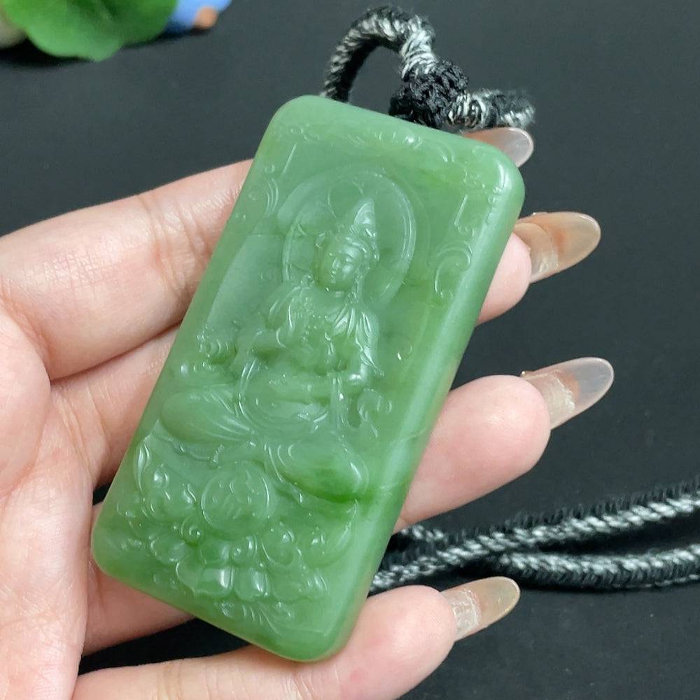 Huiliu certified Hetian jade pendant featuring Guanyin figure with rope, showcasing intricate craftsmanship and smooth jade surface.