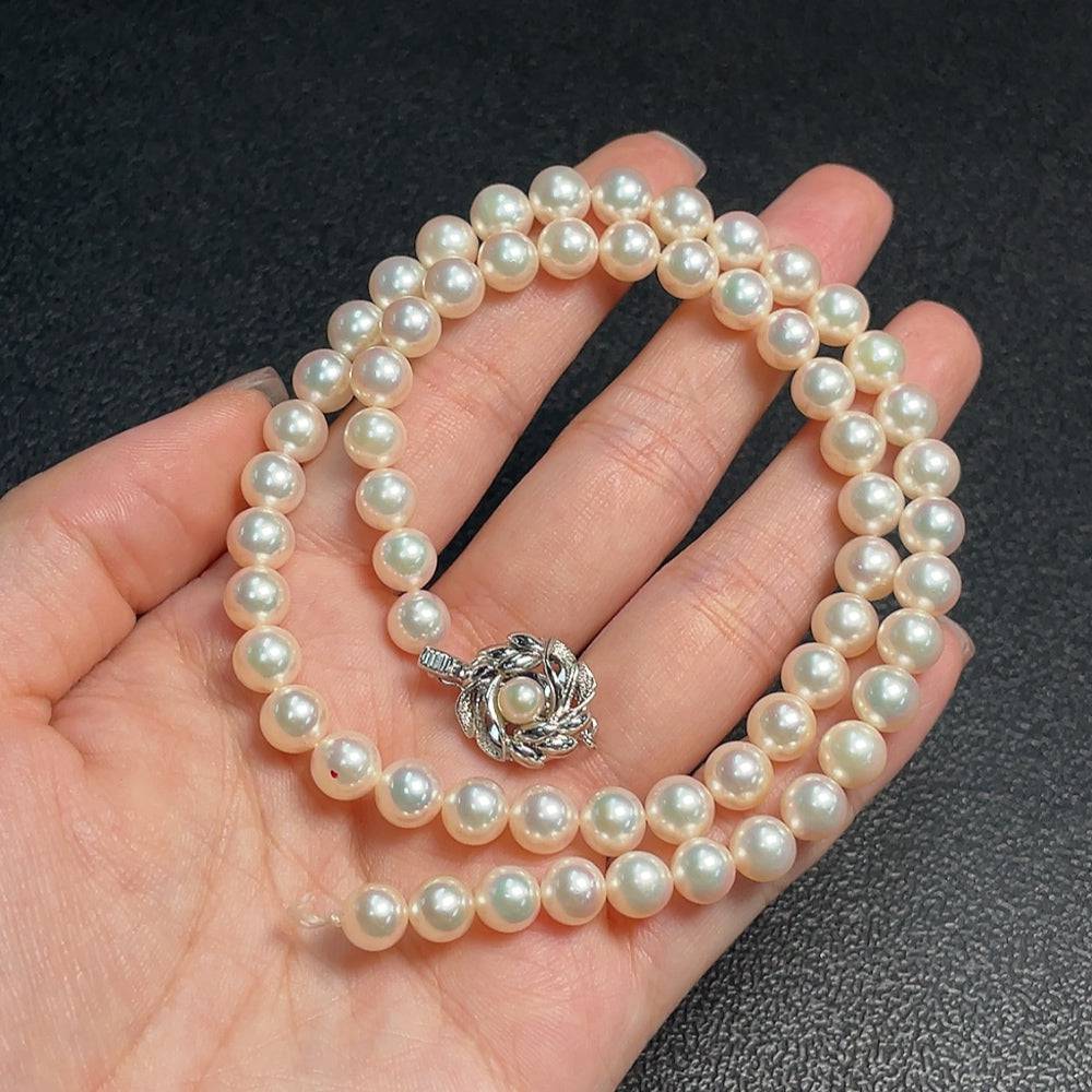 Seawater pearl necklace with 6.8mm pearls, non-gold, approximately 29.84g, by HUILIU HQ, displayed on a plain background