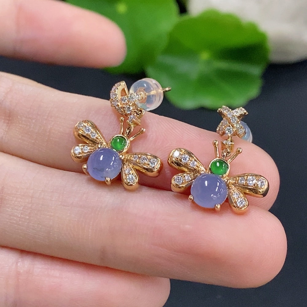 Jadeite cabochon earrings with 18K gold and diamond accents by HKHQ, showcasing elegant green jade stones and delicate design.