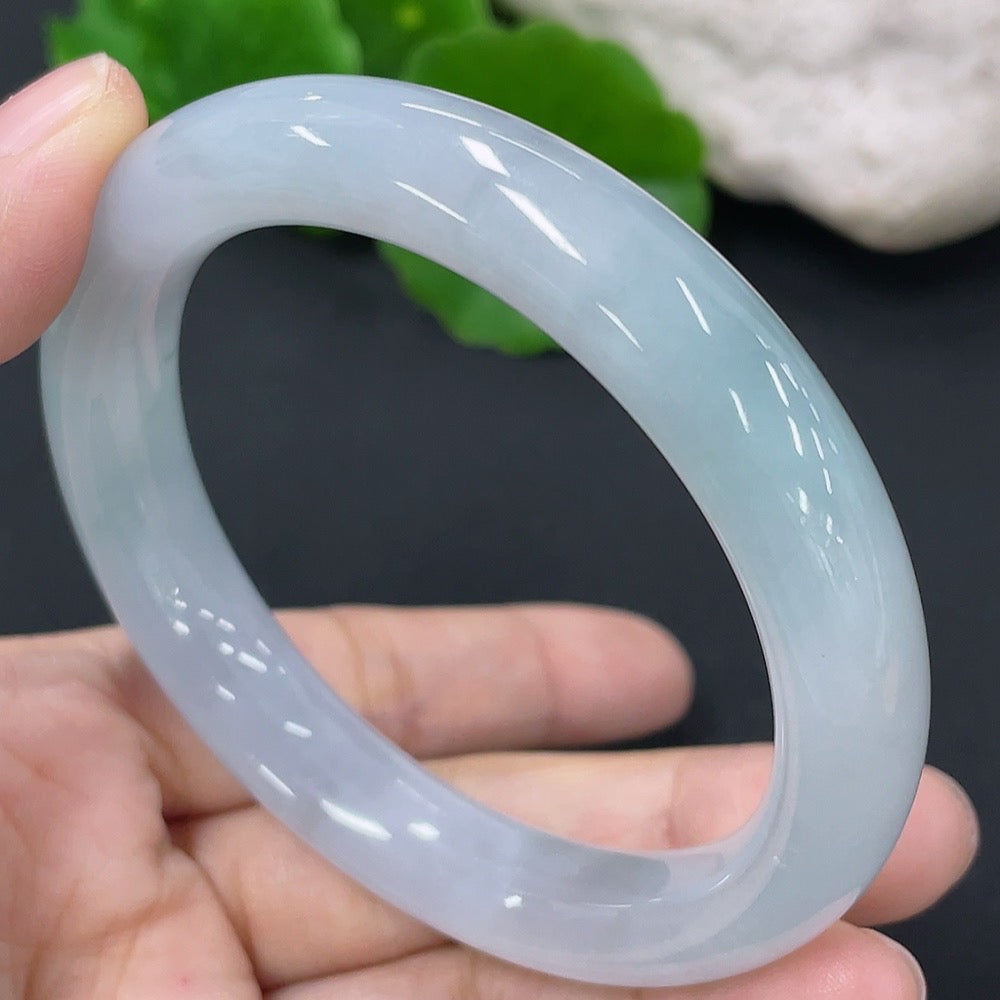 HKHQ jadeite round bangle in size 54, weighing 51.82g, featuring smooth, polished green jadeite bracelet on a plain background.