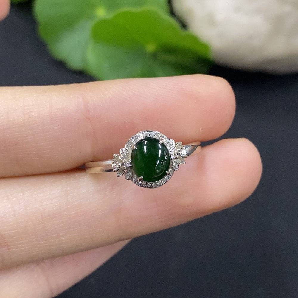 Huiliu Jadeite cabochon ring with diamond accents, showcasing a polished green jade stone and sparkling diamond details.