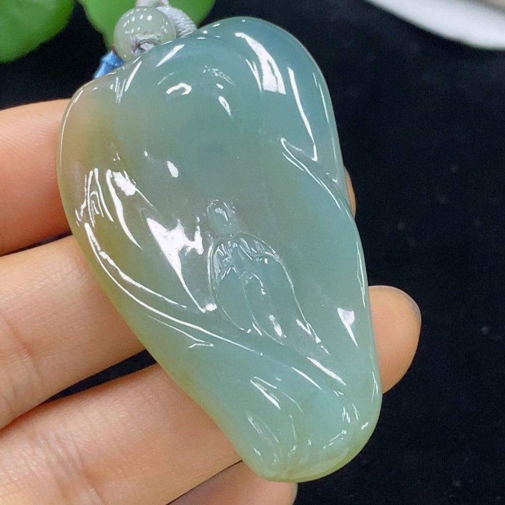 HUILIU HQ Jadeite Formless Pendant showcasing smooth, polished jade with a natural, flowing shape and rich green color.