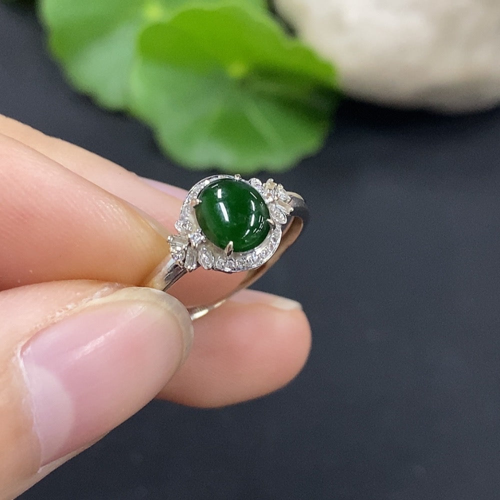 HUILIU HQ Jadeite cabochon ring with diamond accents, featuring a smooth green jade stone and sparkling diamond details.