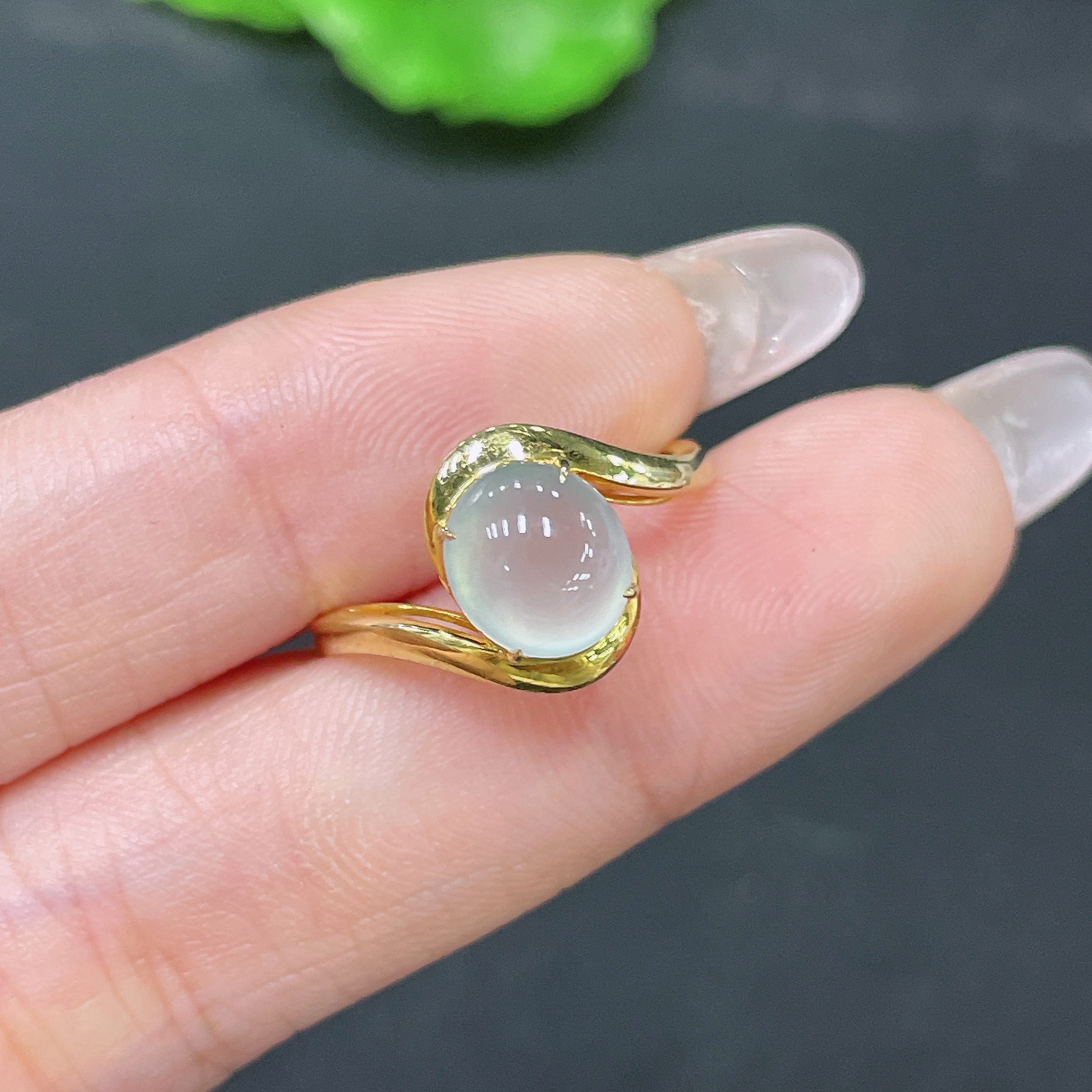 Huiliu certified jadeite ring setting with intricate metalwork, designed to hold a jade gemstone, showcasing craftsmanship and elegance.
