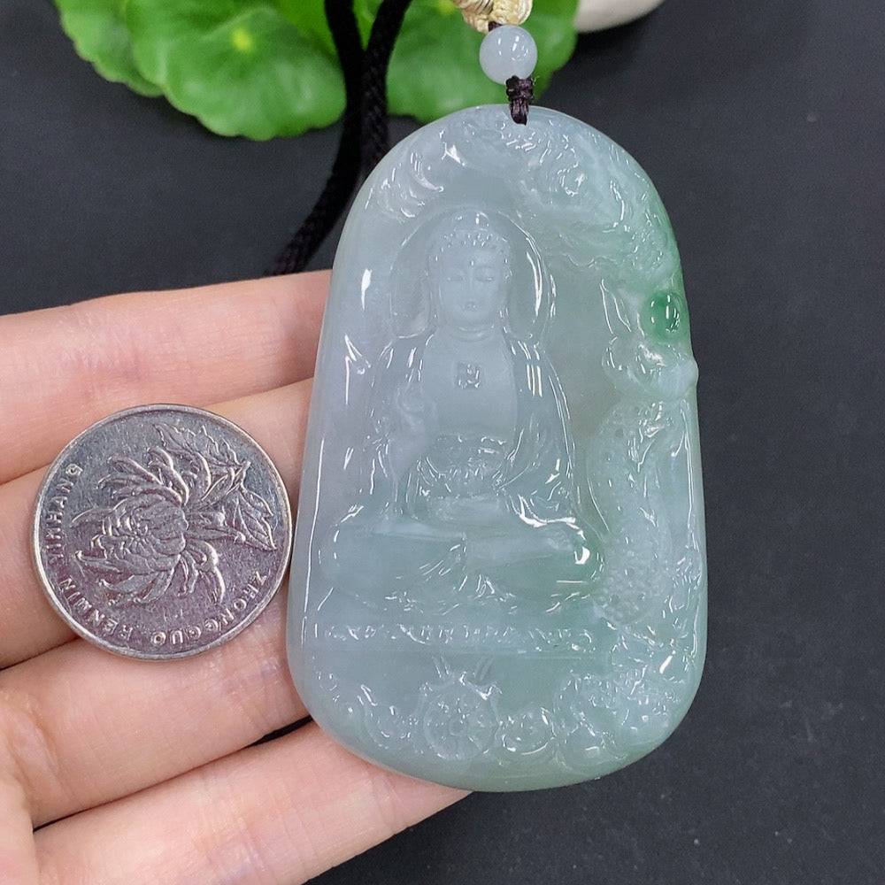 Jadeite Amitabha pendant by HUILIU HQ featuring a smooth, green jade Buddha figure on a natural stone background.