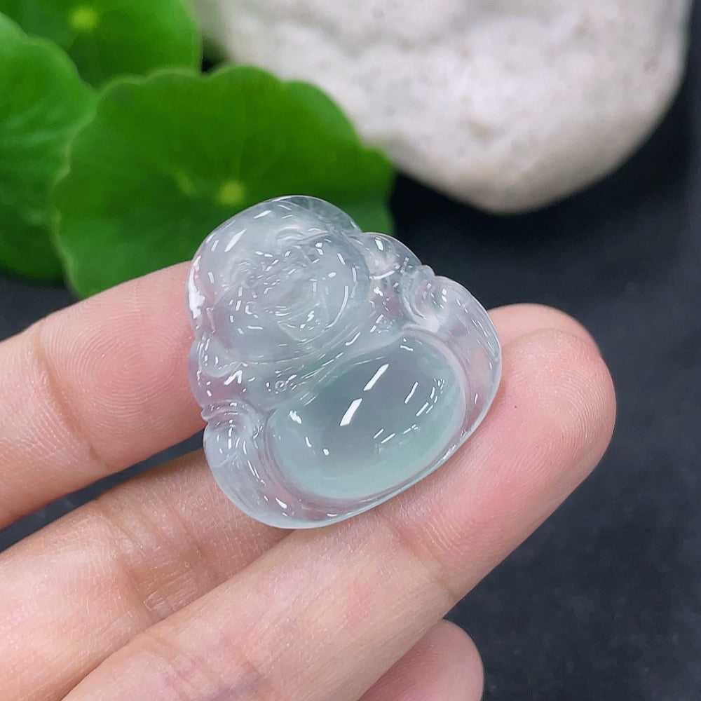 Jadeite pendant featuring a Buddha design on a necklace, weighs approximately 5.05 grams, by HKHQ.