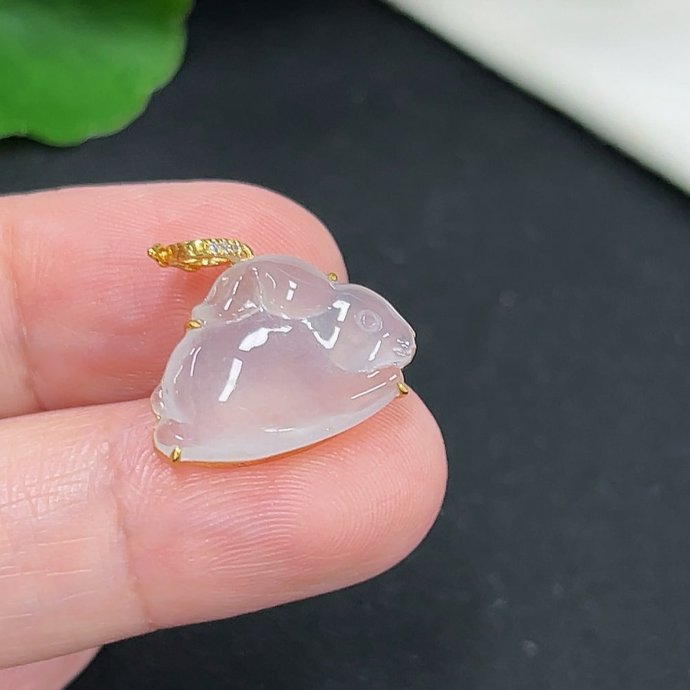 Jadeite rabbit pendant with 18K gold and diamond inlay, HKHQ brand, showcasing detailed craftsmanship and vibrant green jade.