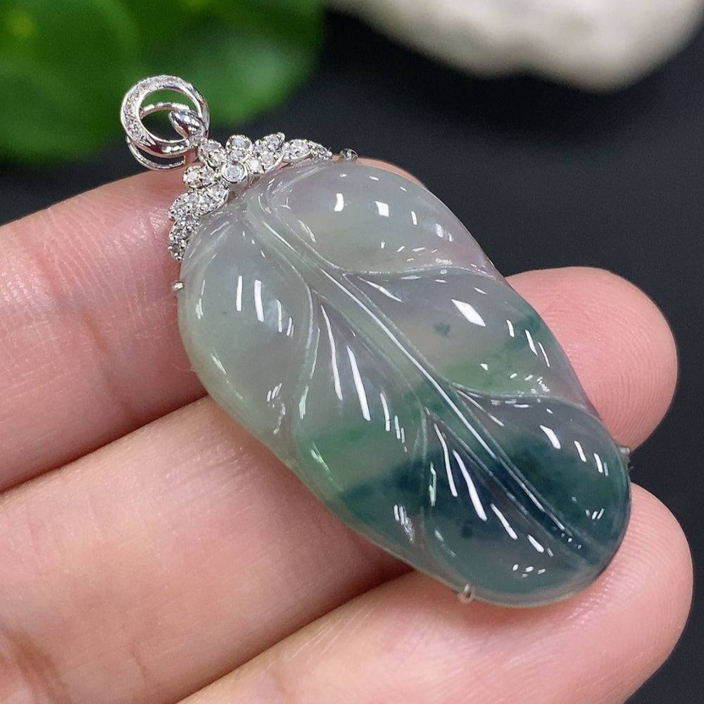 Jadeite leaf inlay pendant with diamond accents, crafted in 18K gold, weighing approximately 3.9 grams, by HUILIU HQ.