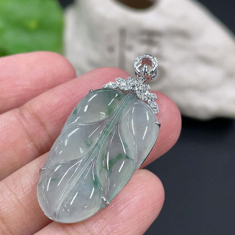 Jadeite leaf pendant in 18K gold setting with diamond accents, weighing approximately 4.6g, crafted by HUILIU HQ.